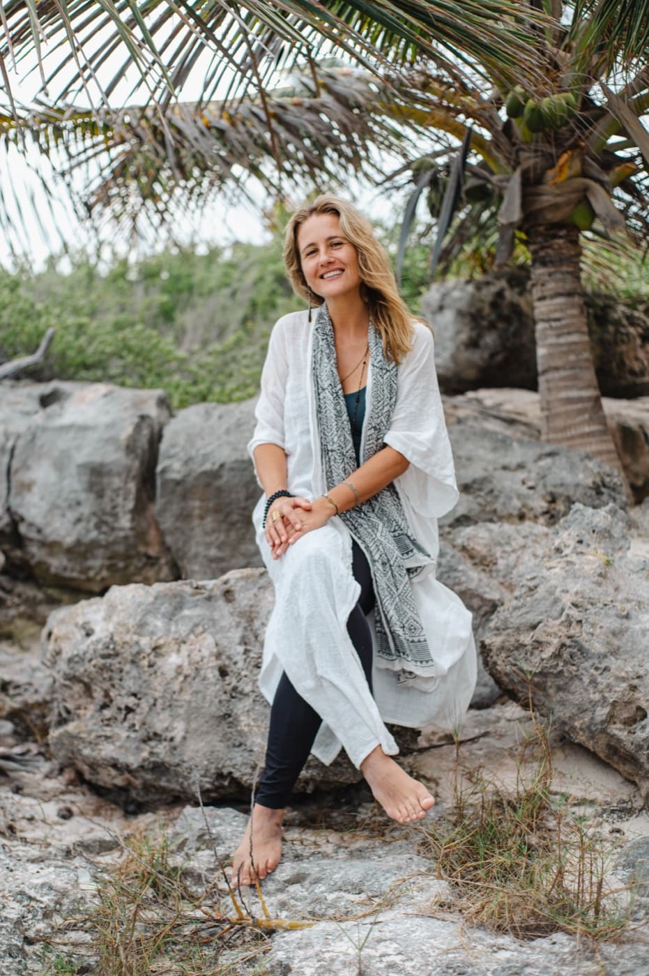 Sabine outdoors in Tulum, relaxed and present
